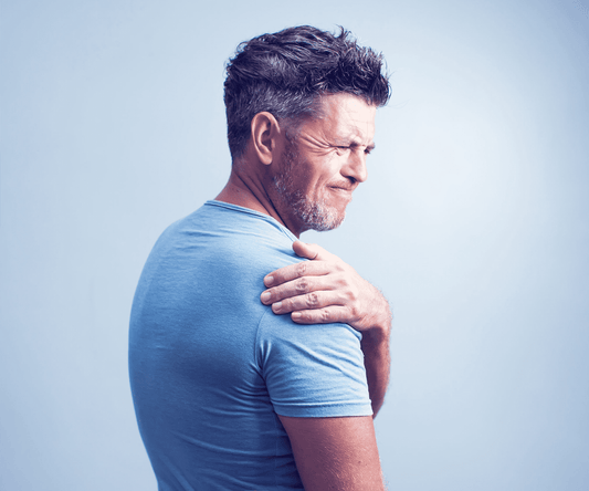 Man experiencing muscle soreness and joint pain